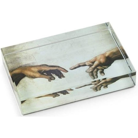 Rectangle shaped clear paperweight with two hands and fingers almost touching
