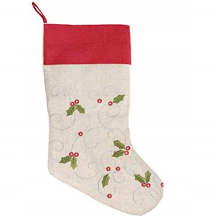 Tan Christmas stocking with silver swirls and holly accent with a red cuff and loop for hanging.