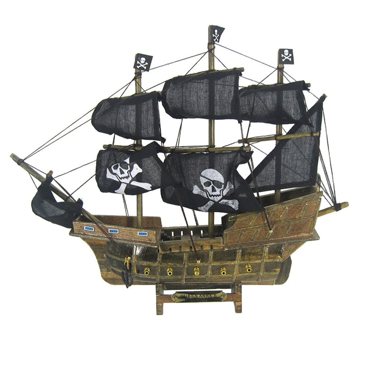 Wood brown pirate ship with black sails with white skull & crossbones.