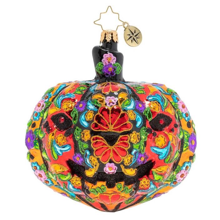 pumpkin shaped hanging ornament very busy colorful orange red with blue accents