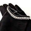 this image shows the rhinestone border at the wrists, made with white diamond and pearl rhinestones.