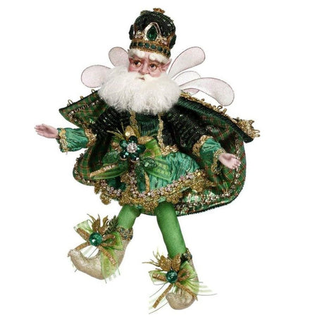 White bearded fairy in an emerald green outfit.