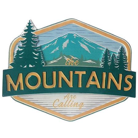 Metal sign that says The Mountains Are Calling.