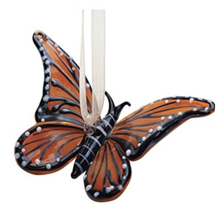 Butterfly shaped hanging oranament in a shade of brown/orange with black. Cream ribbon hanger.
