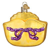 back of gold mardi gras mask with purple tie on back