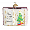 Ornament shape like an open book. Left side says: 'Twas the night before Christmas and the right page is a graphic of a Christmas tree with gold ribbon and star and 2 gifts underneath. The book is red with white pages and glitter accent.