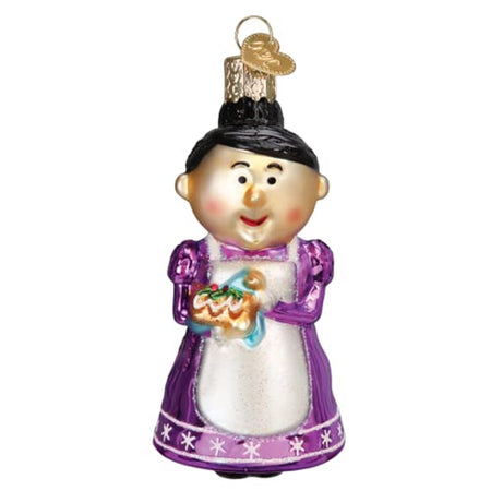 Mrs. Claus shaped hanging ornament. She wears a long purple dress with white apron and holds a baked item like maybe a bread or cake. She wears her black hair in a bun.