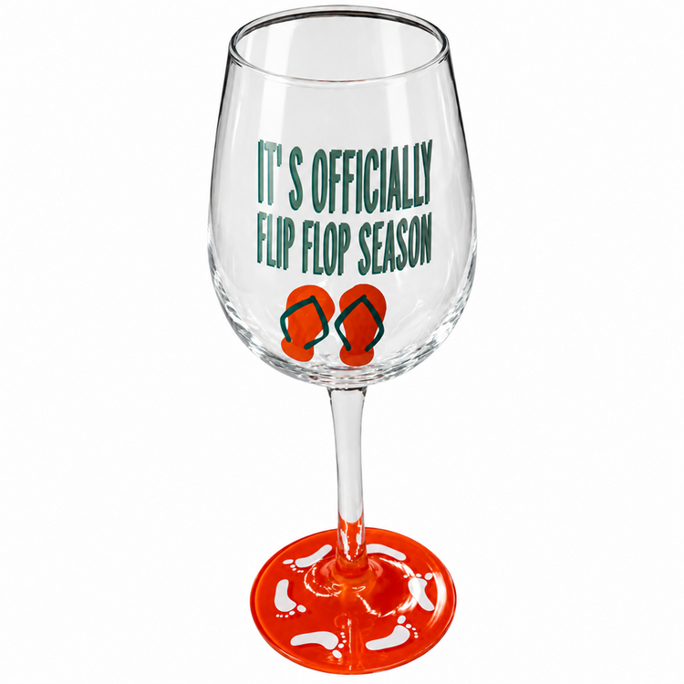 Wine glass with a red stem, flip flops & "it's officially flip flop season" on the glass