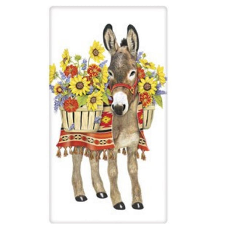 White towel with small brown donkey, the donkey is wearing a red blanket and carrying baskets of sunflowers.