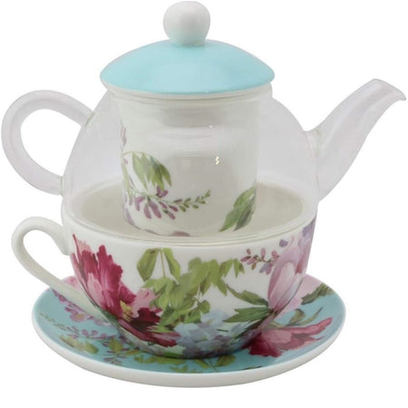 Tea for One with floral print. Saucer is light blue background and teapot and cup are white background. Teapot body is see through to white floral infuser.