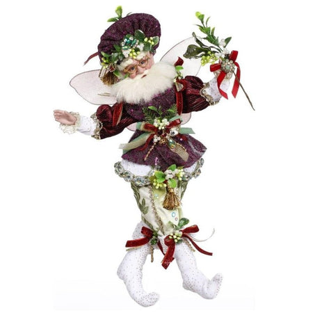 Bearded fairy wearing sparkly purple best and matching hat, white pants and boots, all adorned with mistletoe sprigs with berries and red ribbon,
