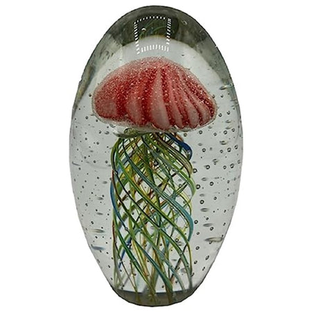 Oval glass shape with a jellyfish figure in pink encased in the resin with green and blue tentacles in a swirl pattern.
