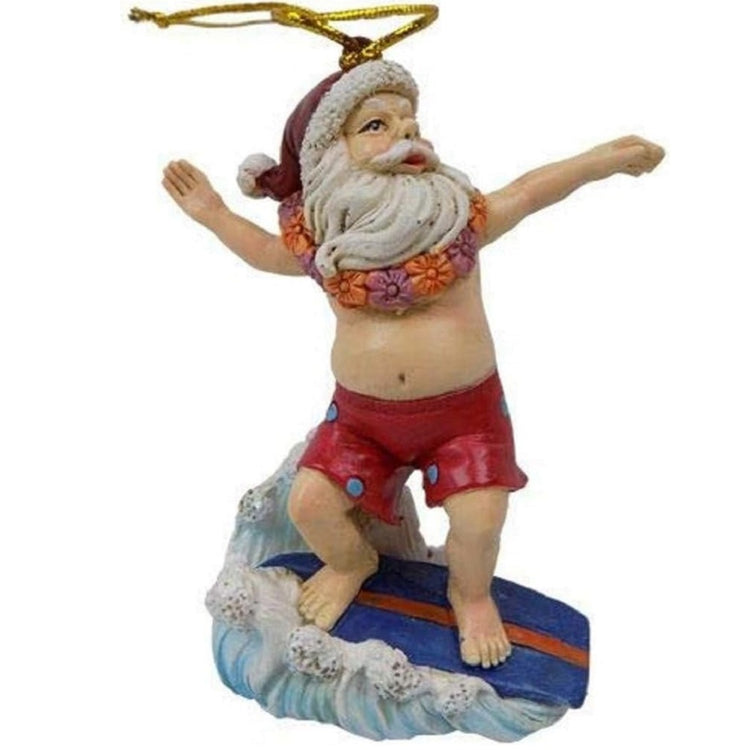 Santa riding a blue surfboard. Santa is wearing a red bathing suit, lei and traditional hat.