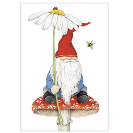 white flour sack towel with image of a garden gnome sitting on a red toadstool, holding a white daisy.