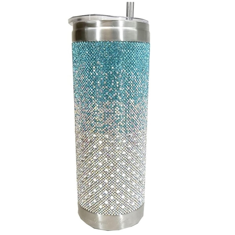 Metal tumbler with clear plastic lid. Turquoise rhinestones fade into white silver rhinestones for an ombre look on the outside of tumbler.