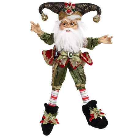 White bearded elf wearing a festive Christmas costume.