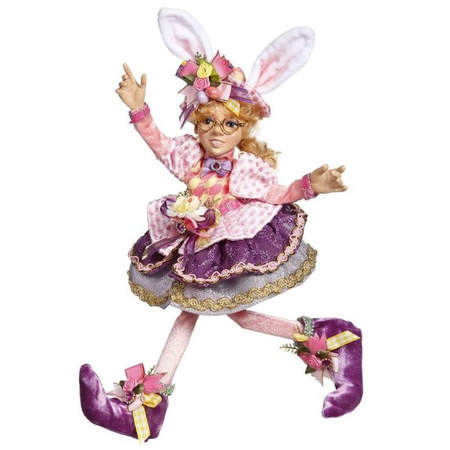 girl elf wearing bunny ears, pink and purple dress and matching shoes.
