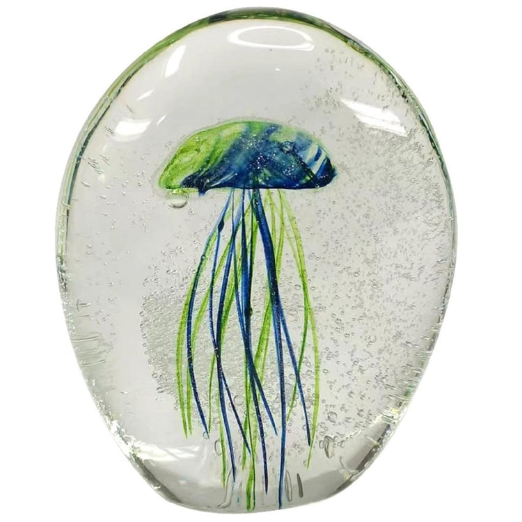 Clear paperweight with a green & blue jellyfish inside.
