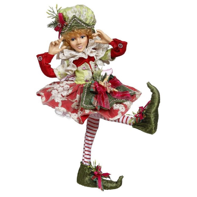 Elf girl with a red & green Christmas outfit & hat.