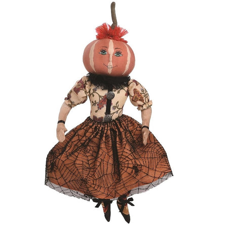 Girl pumpkin head in a dress.