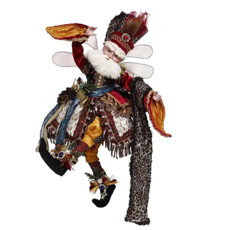 Bearded fairy wearing gold and burgundy with a leopard patterned scarf and hat.