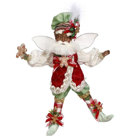 african american bearded fairy in red vest, green pants and hat, all adorned with gingerbread men.