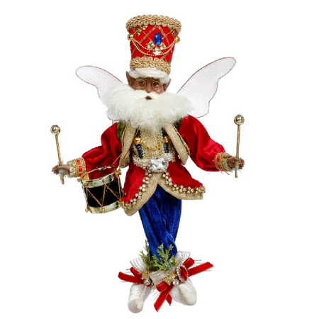 African American Bearded fairy wearing red and blue soldier outfit with a drum. Holding drumsticks.