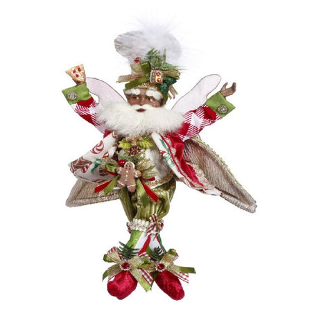 african american fairy wearing red and green outfit with gingerbread and cookie accents.