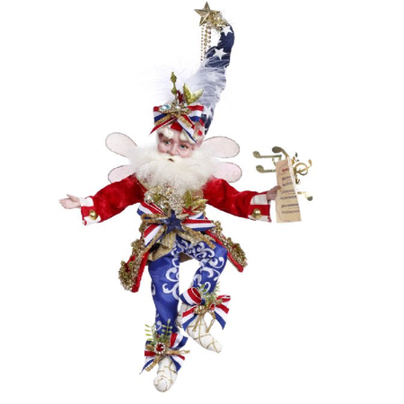 bearded fairy in red coat, blue pants, and red white and blue star patterned stocking cap.