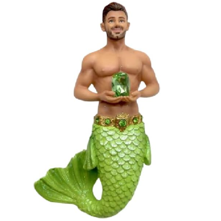 Merma2 figurine with light green tail and holding a light green gemstone on a white background