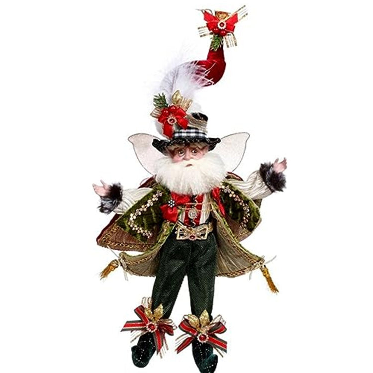 standing fairy wearing green pants, booties a gold jacket and red shirt. Tall pointy hat. White beard and wings.  lots of bows