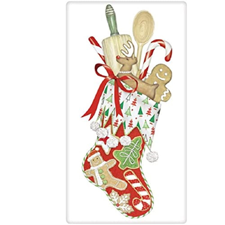 Christmas stocking in red with patches of gingerbread, candy cane and tree.  The stocking is stuffed with kitchen utencils and cookies