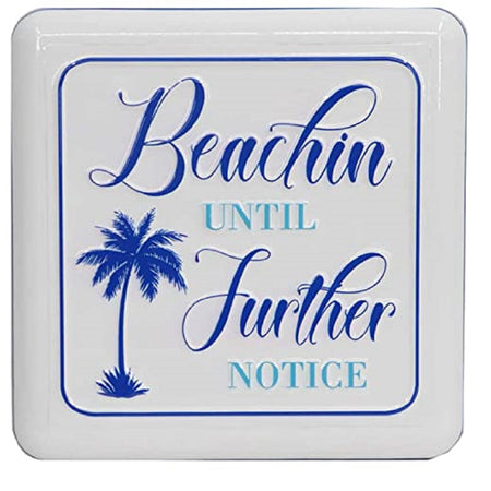 Square sign with blue and teal letters that reads: Beachin until further notice. Palm tree accent on off white.