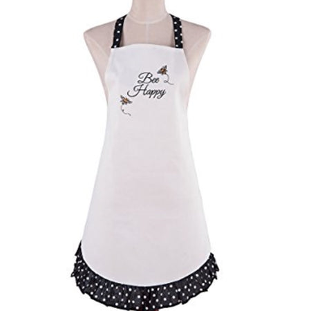 white apron with black trim and ruffle with white dots. Embroidered bees on chest area and text: Bee Happy.