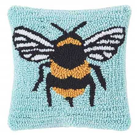 square pillow with hooked rug texture, light blue back ground and yellow and black bumblebee design