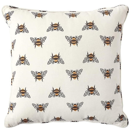 off white pillow with printed design of yellow and black striped bees.