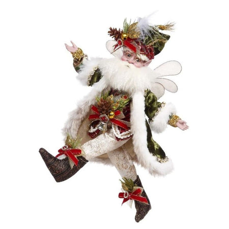 bearded fairy wearing long green coat trimmed in white fur, with matching hat and gold pants.