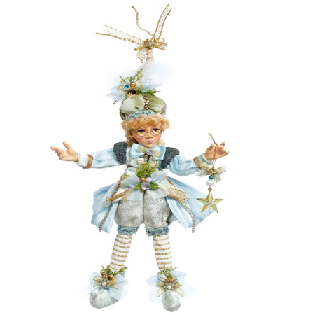 girl elf wearing light blue and white outfit with gold accents and a star ornament.