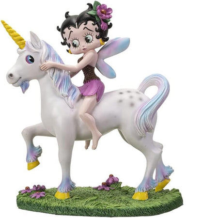 White unicorn with yellow horn and matching horse shoes. Blue and purple in main, tail and hooves. Betty wears purple flowers in her hair, a purple skirt and wings that match the unicorn hair.