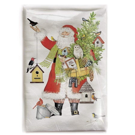 White flour sack towel with an image of santa, carrying a bunch of birdhouses and a small pine tree