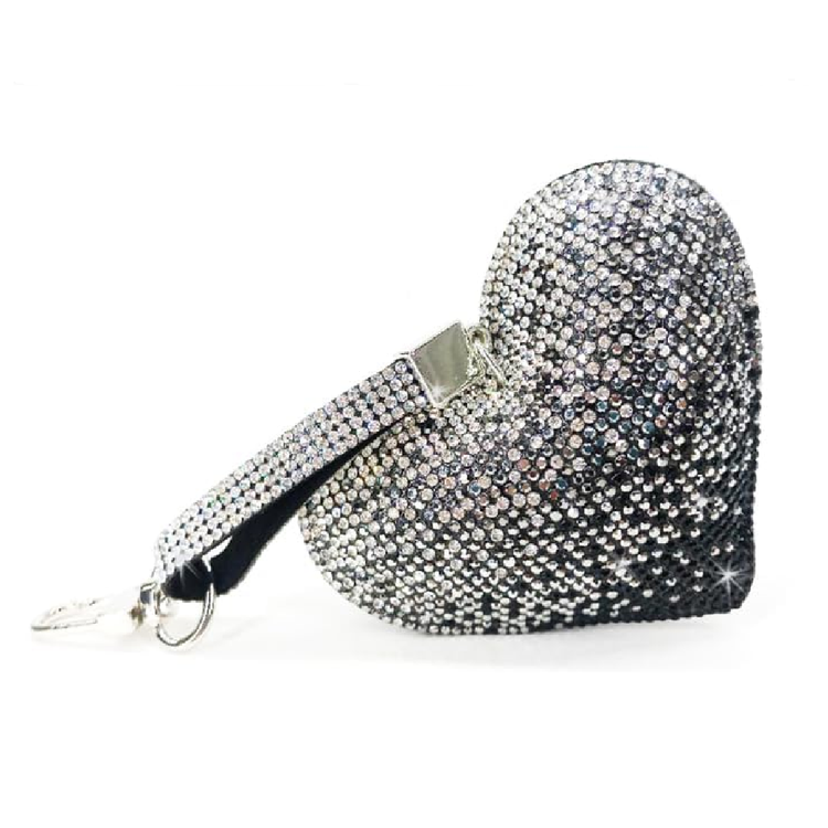 Decorative keychain with rhinestone embellishments on a white background