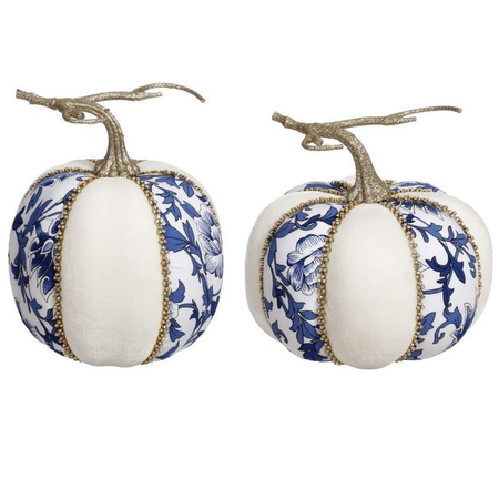 white pumpkins with blue floral design and rhinestone accents.