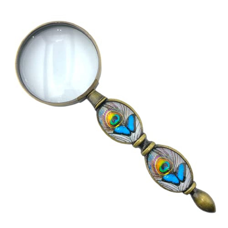magnifying glass with 2 oval glass pieces in the handle featuring a blue butterfly