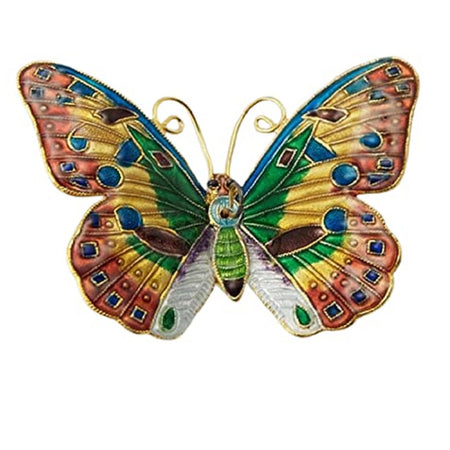 colorful butterfly ornament with yellow, red, green and gold accent.