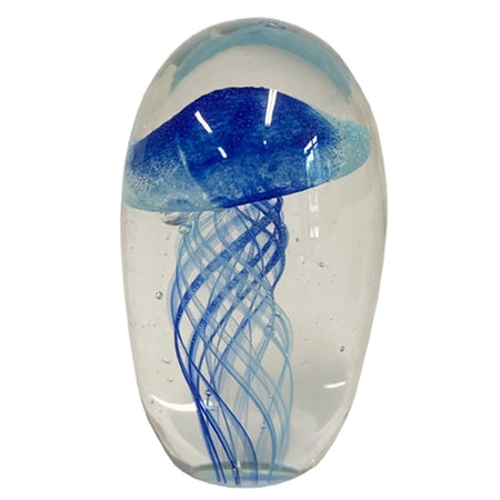 Jellyfish figure that is blue and light blue encased in a clear glass paperweight
