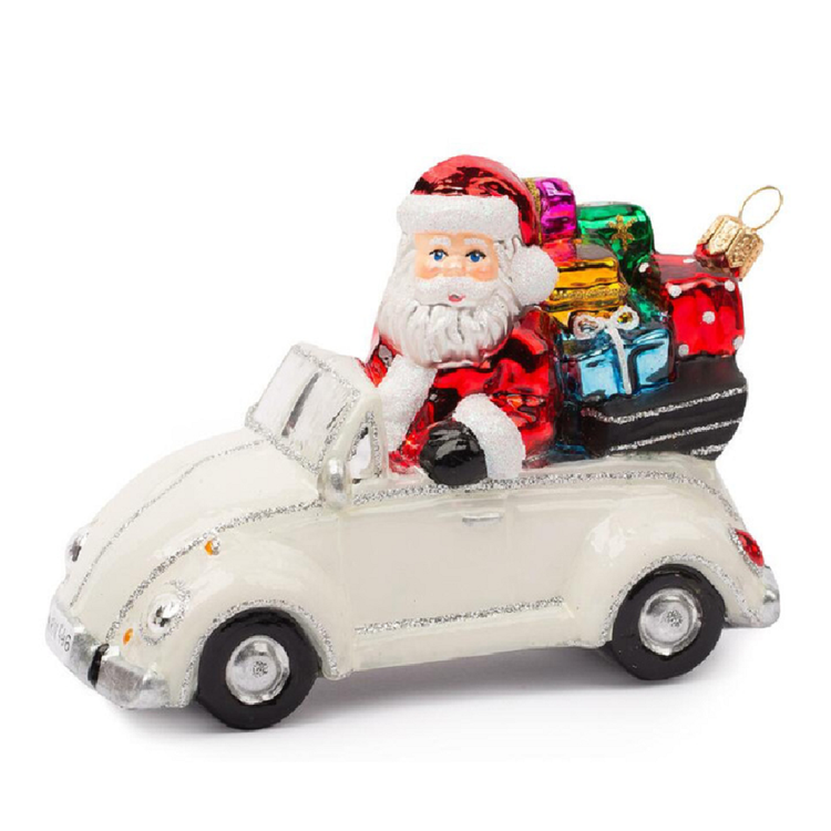 Blown glass ornament, Santa in a white convertible with presents in the back seat.