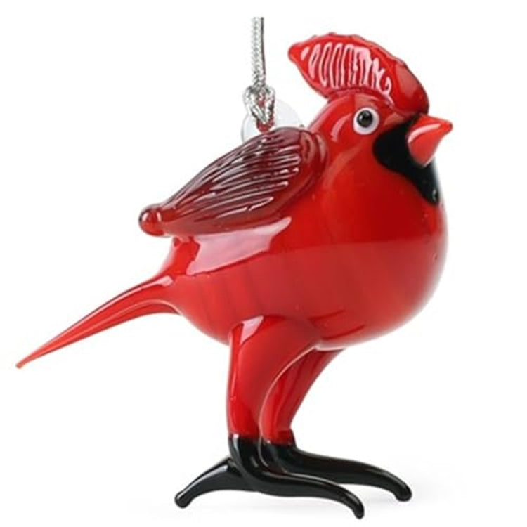 Hanging ornament shaped like a cardinal. Red with black feet it is standing.