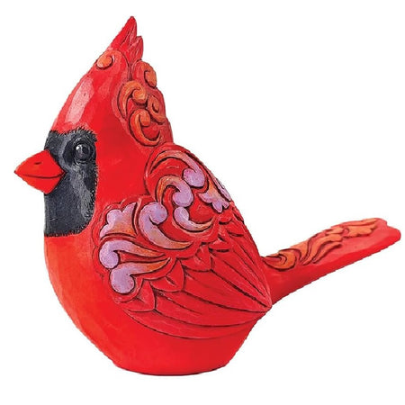 red carved cardinal figurine