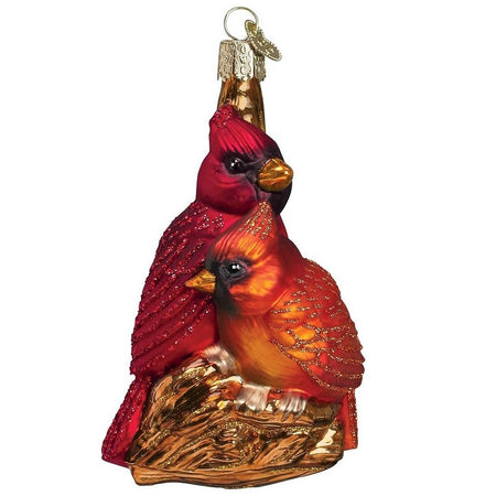 blown glass ornament, 2 cardinals cuddled together on a branch.