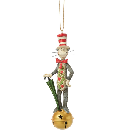 A Dr. Seuss Cat in the Hat Christmas ornament featuring the character standing on a gold bell and holding a green umbrella, with a red and white striped hat, against a white background.